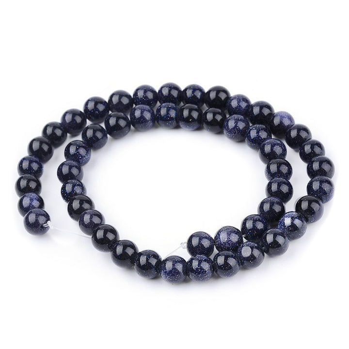 Glittery Navy Blue Goldstone Beads, Round, Dark Navy Blue Color. Semi-Precious Gemstone Beads for DIY Jewelry Making.   Size: 4-4.5mm Diameter, Hole: 0.8mm; approx. 92-94pcs/strand, 14.5" Inches Long.  Material: Synthetic Blue Goldstone Beads. High Quality Man Made Stone. Dark Navy Blue Color with Lots of Glitter. Shinny, Polished Finish. 