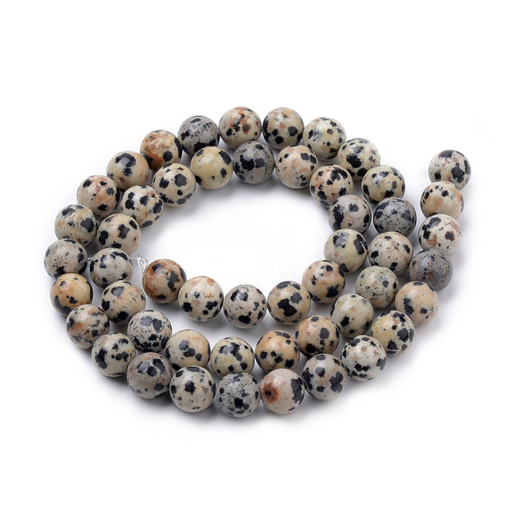 Natural Dalmatian Jasper Beads Strands, Round. Dalmatian Stone, also called Dalmatian Jasper, is a Pale Grey-Cream or Beige-Brown Jasper Stone with Brown and/ or Black Spots. Dalmatian Jasper Semi-precious Gemstone Beads for DIY Jewelry Making.  Size: 10mm Diameter, Hole: 1mm, approx. 37-39pcs/strand, 15" Inches Long.   Material: Genuine Dalmatian Jasper Semi Precious Stone Beads, Round, Cream Color with Black Spots. Polished, Shinny Finish.