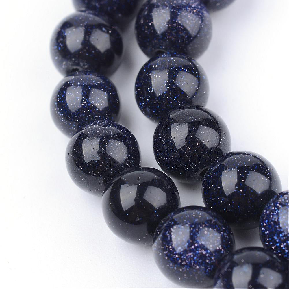 Glittery Navy Blue Goldstone Beads, Round, Dark Navy Blue Color. Semi-Precious Gemstone Beads for DIY Jewelry Making.   Size: 4-4.5mm Diameter, Hole: 0.8mm; approx. 92-94pcs/strand, 14.5" Inches Long.  Material: Synthetic Blue Goldstone Beads. High Quality Man Made Stone. Dark Navy Blue Color with Lots of Glitter. Shinny, Polished Finish. 