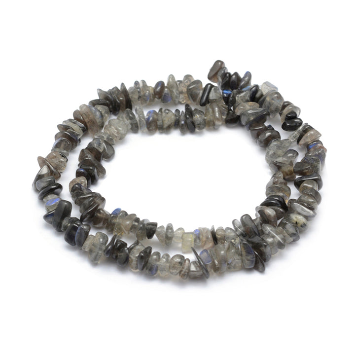 Grade A Natural Black Labradorite Chips, Grey Black Color Chips. Premium Grade Glimmering Labradorite Semi-Precious Stone Chip Beads for Jewelry Making.   Size: approx. 5~8mm wide, 5~8mm long, hole: 1mm; approx. 15" inches long.  Material: Premium Grade A Natural Labradorite Stone Beads. Greyish Black Colored Stone Chip Beads. Polished, Shinny Finish.