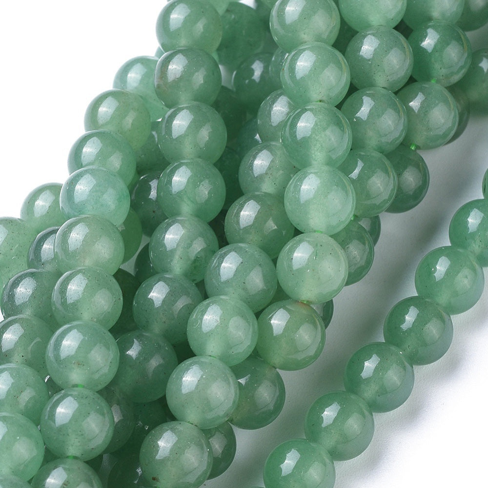 Natural Green Aventurine Beads, Green Color. High Quality Semi-Precious Gemstone Beads for DIY Jewelry Making.   Size: 10mm Diameter, Hole: 1mm, approx. 37-39 pcs/strand 15" Inches Long.   Material: Genuine Natural Green Aventurine Stone Loose Beads, Green Color.  Polished Finish.   Green Aventurine Properties:  Green Aventurine Stone provides Courage, Confidence, Happiness and Strength. It's Believed to Increase Optimism and the Will Power to Take Action. 