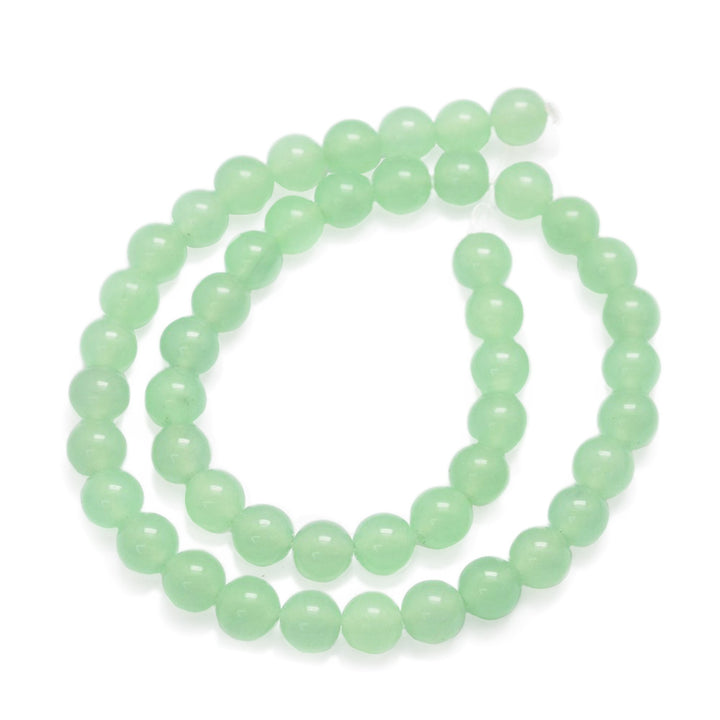 Natural Green Jade Crystal Beads, Round, Dyed, Light Green Color. Semi-Precious Gemstone Beads for DIY Jewelry Making.   Size: 4mm Diameter, Hole: 0.8mm; approx. 91-92pcs/strand, 15 Inches Long.  Material: Natural Malaysia Green Jade Beads dyed Pale Light Green Color. Polished Finish.