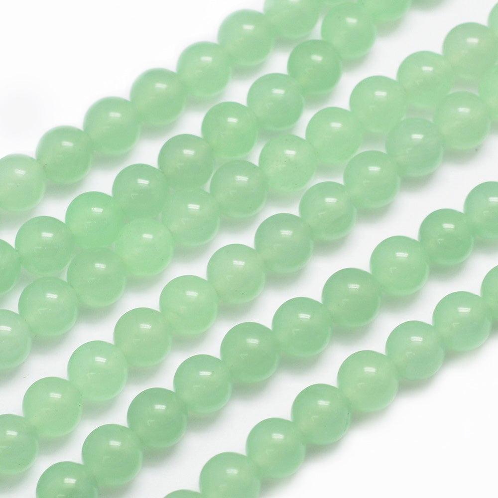 Natural Green Jade Crystal Beads, Round, Dyed, Light Green Color. Semi-Precious Gemstone Beads for DIY Jewelry Making.   Size: 4mm Diameter, Hole: 0.8mm; approx. 91-92pcs/strand, 15 Inches Long.  Material: Natural Malaysia Green Jade Beads dyed Pale Light Green Color. Polished Finish.