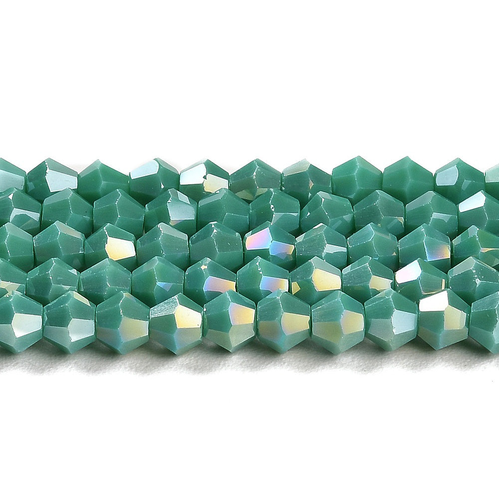 Opaque Glass Beads, Faceted, AB Color Plated Turquoise Color, Bicone, Glass Crystal Beads for Jewelry Making.&nbsp;

Size: 4mm Length, 4mm Width, Hole: 1mm; approx. 92pcs/strand, 13.75" inches long.

Material: Solid Color Electroplated Crystal Imitation&nbsp;Glass Beads, Rondelle, Opaque Turquoise Colored Beads. Polished, Shinny Finish.&nbsp;