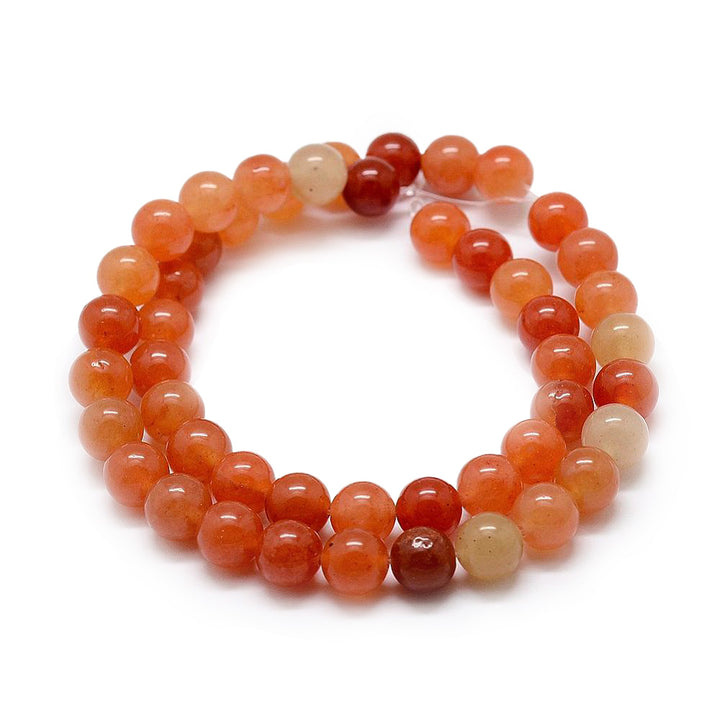 Natural Red Aventurine Bead Strands, Round, Orange Color. Semi-Precious Polished Aventurine Beads for Jewelry Making.   Size: 8mm in diameter, hole: 1mm; approx. 42pcs/strand, 15" inches long.  Material: The Beads are Natural Red Aventurine Stone. Orange Color. Polished Finish.  Red Aventurine Properties: A Stone that Motivates One to Take Physical Action that Will Make Their Dreams Come True.  Red Aventurine Gemstones Amplify Energy; these Gems Revitalize and Renew.  It Boosts Confidence and Will Power.   