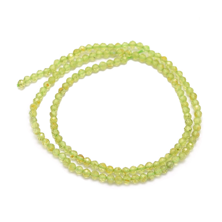 Faceted Peridot Beads, Round, Green Color. Semi-Precious Stone Beads for DIY Jewelry.  Size: 2mm Diameter, Hole: 0.5mm; approx. 210-220pcs/strand, 15" Inches Long.  Material: Genuine Natural Faceted Peridot Beads, Green Color. Polished Finish.