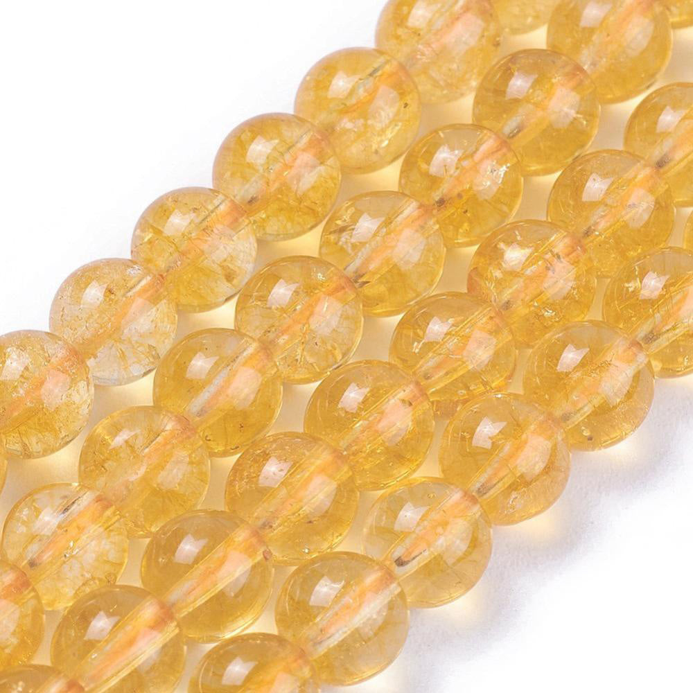 Citrine Beads, Round, Yellow Color. Semi-Precious Gemstone Beads for DIY Jewelry Making. Gorgeous, High Quality, Clear Deep Yellow Colored Citrine Beads.  Size: 6mm Diameter, Hole: 1mm; approx. 60pcs/strand, 15 inches long.  Material: Genuine Natural Citrine Beads, High Quality Stone Beads. Clear Deep Yellow Color, Polished, Shinny Finish. 