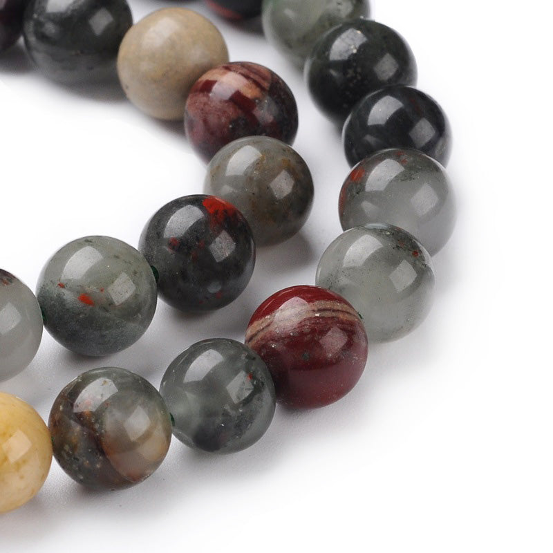 African Bloodstone Beads, Natural Heliotrope Semi-Precious Stone Beads.  Size: 6mm Diameter, Hole: 1mm; approx. 60-62pcs/strand, 15" Inches Long.  Material: Genuine Heliotrope Stone Beads; African Bloodstone Beads. Multi-color, Polished, Shinny Finish.