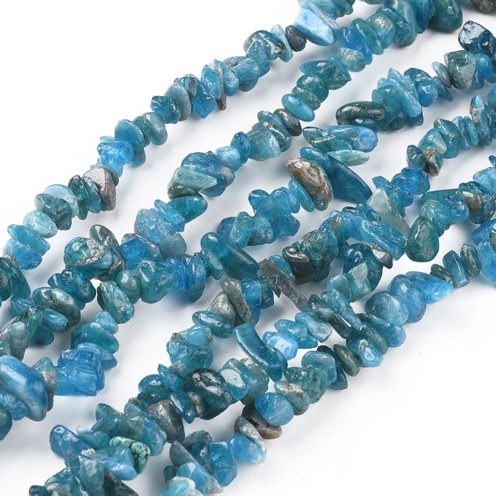 Sky Blue Apatite Chip Beads, Semi-Precious Stone Chips for DIY Jewelry Making.  Size: approx. 3-8mm wide, 5-13mm long, hole: 1mm; approx. 32" Inches Long.  Material: Genuine Natural Apatite Chip Beads. Dark Sky Blue Colored Chip Beads. Polished, Shinny Finish.