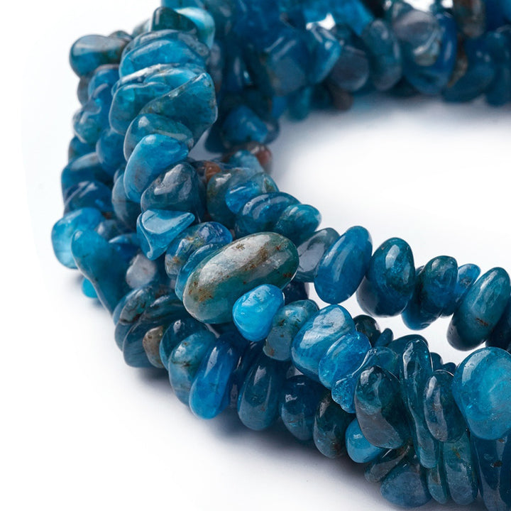 Genuine Blue Apatite Chip Beads, Semi-Precious Stone Chips for DIY Jewelry Making.  Size: approx. 4-13mm wide, 3-12mm long, hole: 1mm; approx. 32" Inches Long.  Material: Natural Apatite Chip Beads. Blue Colored Chip Beads. Polished, Shinny Finish.