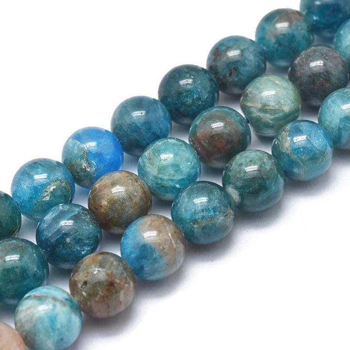 Stunning Blue Apatite Beads, Round, Blue Color. Semi-Precious Crystal Gemstone Beads for Jewelry Making.  Size: 8mm in Diameter, Hole: 1mm; approx. 48pcs/strand, 14.75" Inches Long.  Material: Genuine Natural Blue Apatite Crystal Loose Beads. Polished, Shinny Finish.