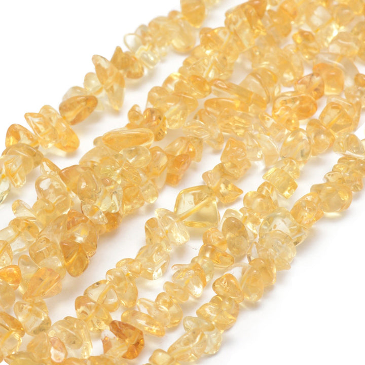 Citrine Chip Beads, Yellow color Semi-Precious Stone Chips.  Size: approx. 5-8mm wide, 5-8mm long, hole: 1mm; approx. 16 inches long.  Material: Premium Grade Genuine Natural Citrine Chip Beads. Yellow Colored Chip Beads. Polished, Shinny Finish.