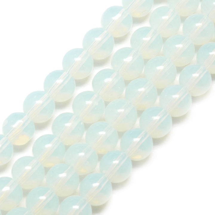 Opal Beads, Round, Clear White Color. Semi-Precious Gemstone Beads for DIY Jewelry Making. Affordable Beads.  Size: 4mm Diameter, Hole: 1mm; approx. 92pcs/strand, 15" Inches Long.  Material: Opal Beads, Synthetic Opalite Beads. Clear White Color. Polished, Shinny Finish. 