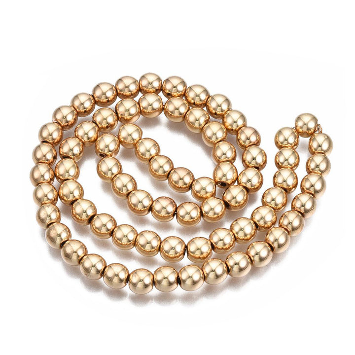 Electroplated Non-Magnetic Hematite Beads, Light Gold Color. Semi-Precious Stone Beads for Jewelry Making.   Size: 2mm Diameter, Hole: 1mm, approx. 195-200pcs/strand, 15" Inches Long.  Material: Non-Magnetic Hematite Beads. Light Gold Color. Shinny Metallic Lustrous Finish.