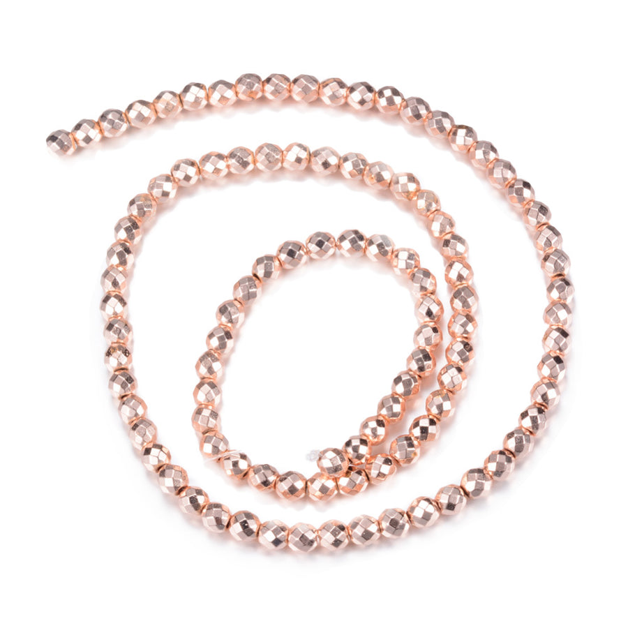 Electroplated Non-Magnetic Synthetic Hematite Beads, Rose Gold Color. Semi-Precious Stone Spacer Beads for Jewelry Making.   Size: 6mm Diameter, Hole: 1mm, approx. 62-65pcs/strand, 15" Inches Long.  Material: Non-Magnetic Synthetic Hematite Beads. Rose Gold Color Plated. Faceted, Round Spacer Beads. Polished, Shinny Metallic Lustrous Finish.
