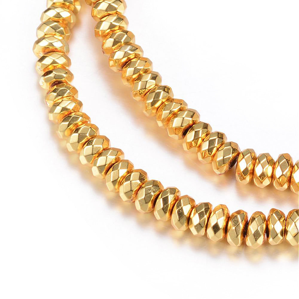 Faceted Electroplated Non-Magnetic Synthetic Hematite Beads, Gold Plated. Semi-Precious Stone Spacer Beads for Jewelry Making.   Size: 4-4.5mm Wide, 2mm Thick, Hole: 1mm, approx. 175pcs/strand, 15.5" Inches Long.  Material: Faceted Non-Magnetic Synthetic Hematite Beads. Gold Color Plated. Rondelle Shape. Polished, Shinny Metallic Lustrous Finish.