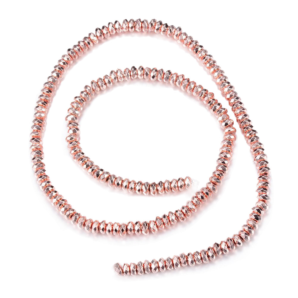 Faceted Electroplated Non-Magnetic Synthetic Hematite Beads, Rose Gold Plated. Semi-Precious Stone Spacer Beads for Jewelry Making.   Size: 4-4.5mm Wide, 2mm Thick, Hole: 1mm, approx. 175pcs/strand, 15.5" Inches Long.  Material: Faceted Non-Magnetic Synthetic Hematite Beads. Rose Gold Color Plated. Rondelle Shape. Polished, Shinny Metallic Lustrous Finish.