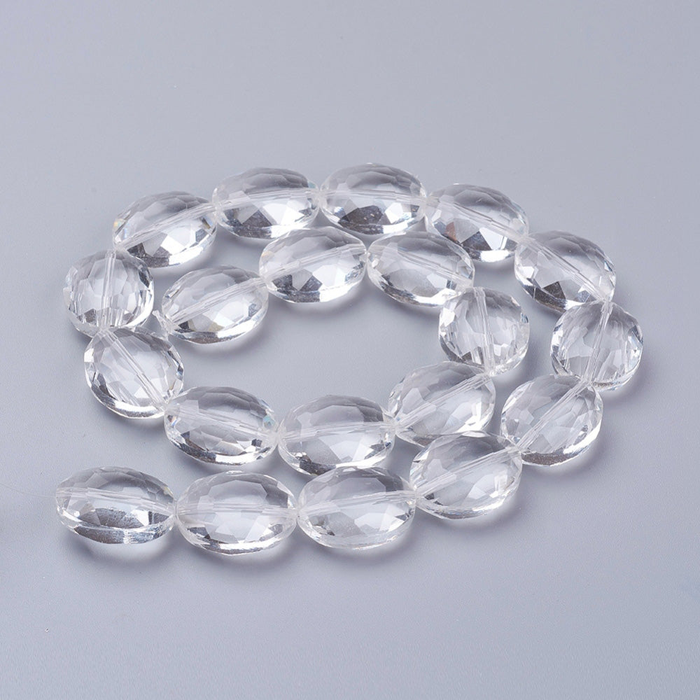 Transparent Faceted Glass Crystal Beads, Oval Shape, Crystal Clear Color.   Size: 20mm Length, 16mm Width, 10mm Thick, , Hole: 1mm, approx. 20pcs/strand  Material: Glass; Austrian Crystal Imitation.  Shape: Oval, Faceted  Color: Clear  Usage: Focal Beads for DIY Jewelry Making.