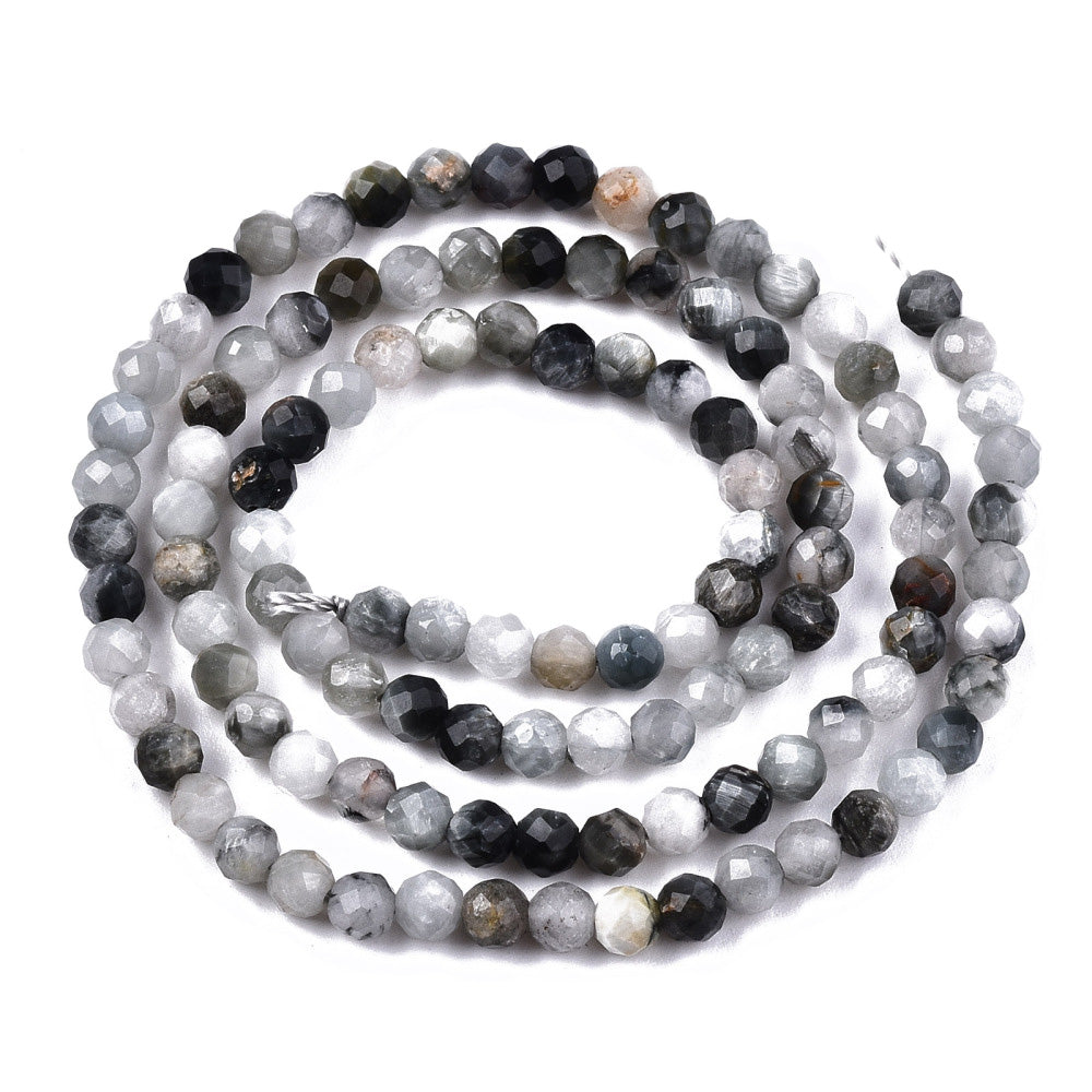 Faceted Eagle Eye Stone Beads, Round, Grey Black Color. Semi-Precious Gemstone Beads for Jewelry Making.   Size: 4mm Diameter, Hole: 0.8mm; approx. 110pcs/strand, 15" Inches Long.  Material: Genuine Eagle Eye Stone Beads. Faceted, Grey Beads. Polished, Shinny Finish.