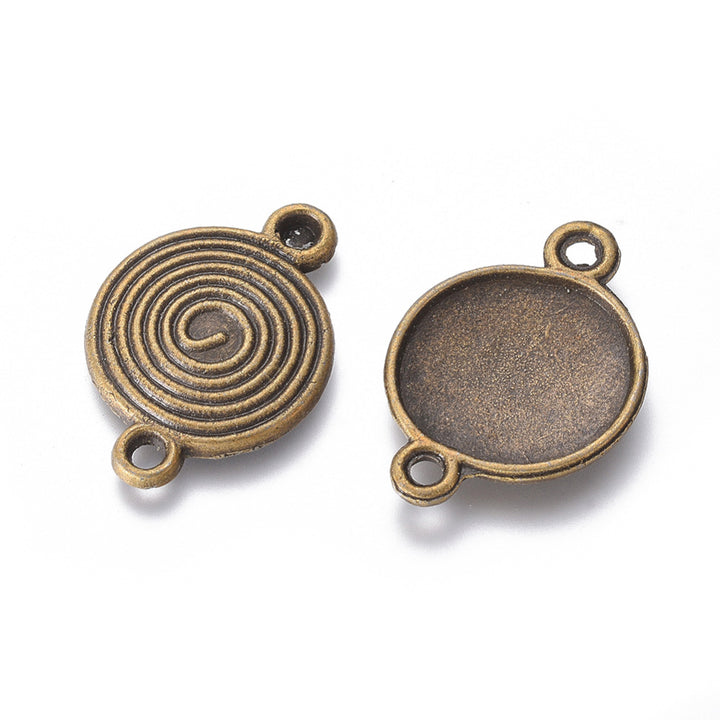 Link Connectors, Flat Round Vortex. Antique Bronze Color Connector for DIY Jewelry Making.   Size: 26mm Length, 18mm Width, 2mm Thick, Hole: 2mm, Quantity: 2pcs/bag.  Material: Alloy (Lead and Cadmium Free) Connectors, Links. Flat Round Vortex, Bronze Color. 