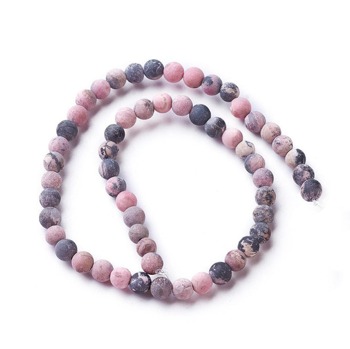 Frosted Natural Rhodonite Beads, Round, Pink Color. Semi-Precious Gemstone Beads for DIY Jewelry Making.   Size: 6mm Diameter, Hole: 1mm; approx. 58-60pcs/strand, 15" Inches Long.  Material: Genuine Frosted Rhodonite Beads, Natural Stone Beads. Pink Color with Black Markings. Unpolished, Matte Finish. 