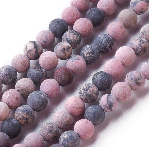 Frosted Natural Rhodonite Beads, Round, Pink Color. Semi-Precious Gemstone Beads for DIY Jewelry Making.   Size: 6mm Diameter, Hole: 1mm; approx. 58-60pcs/strand, 15" Inches Long.  Material: Genuine Frosted Rhodonite Beads, Natural Stone Beads. Pink Color with Black Markings. Unpolished, Matte Finish. 