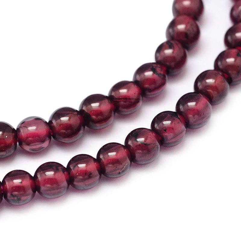 Premium Grade Garnet Beads, Round, Dark Red Color. Semi-Precious Gemstone Beads for Jewelry Making.   Size: 4mm Diameter, Hole: 1mm; approx. 92pcs/strand, 15" Inches Long.  Material: Premium Grade "A" Genuine Dark Red Garnet Stone Beads. Polished, Shinny Finish.