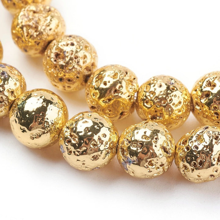 Electroplated Natural Lava Rock Bead Strands, Round, Bumpy, Gold Color. Semi-Precious Stone Beads for DIY Jewelry Making. Perfect Accent Piece for Stretch Bracelets.  Size: 6-7mm Diameter, Hole: 1mm; approx. 65pcs/strand, 15.35 inches long.