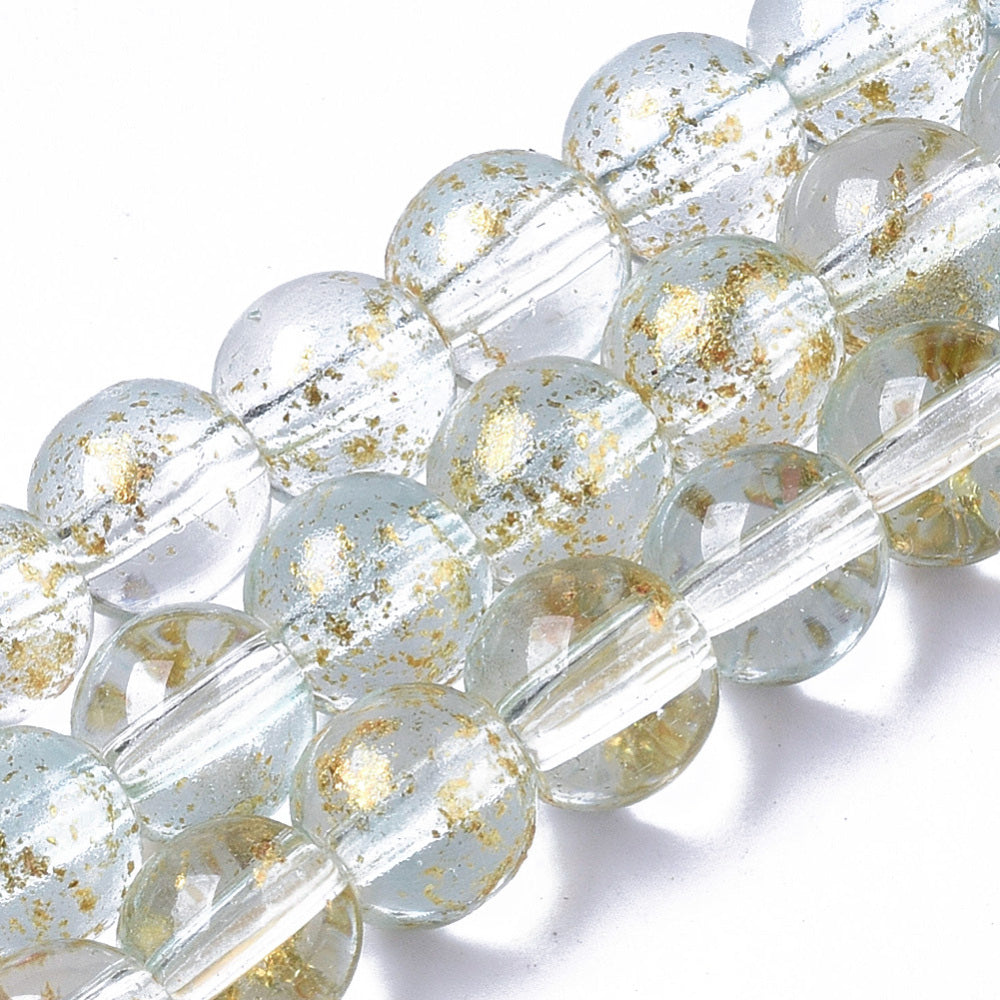 Gold Foiled Transparent Glass Beads, Round, Clear with Blue Hue. Quality Clear Blue Glass Beads for DIY Jewelry Making.   Size: 6mm Diameter, Hole: 1.2mm; approx. 62pcs/strand, 14.5" inches long.  Material: Transparent Glass Beads, Loose Clear Glass Beads with Gold Foil, and Blue Hue. Shinny Finish.