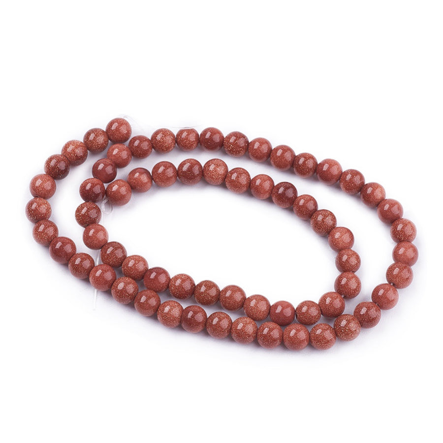 Synthetic Goldstone Beads, Round, Brown Color. Semi-Precious Gemstone Beads for DIY Jewelry Making. Great for Mala Bracelets.   Size: 6mm Diameter, Hole: 1mm; approx. 62pcs/strand, 14" Inches Long.  Material: Synthetic Goldstone Beads. High Quality Man Made Stone. Brown Color with Lots of Glitter. Shinny, Polished Finish. 