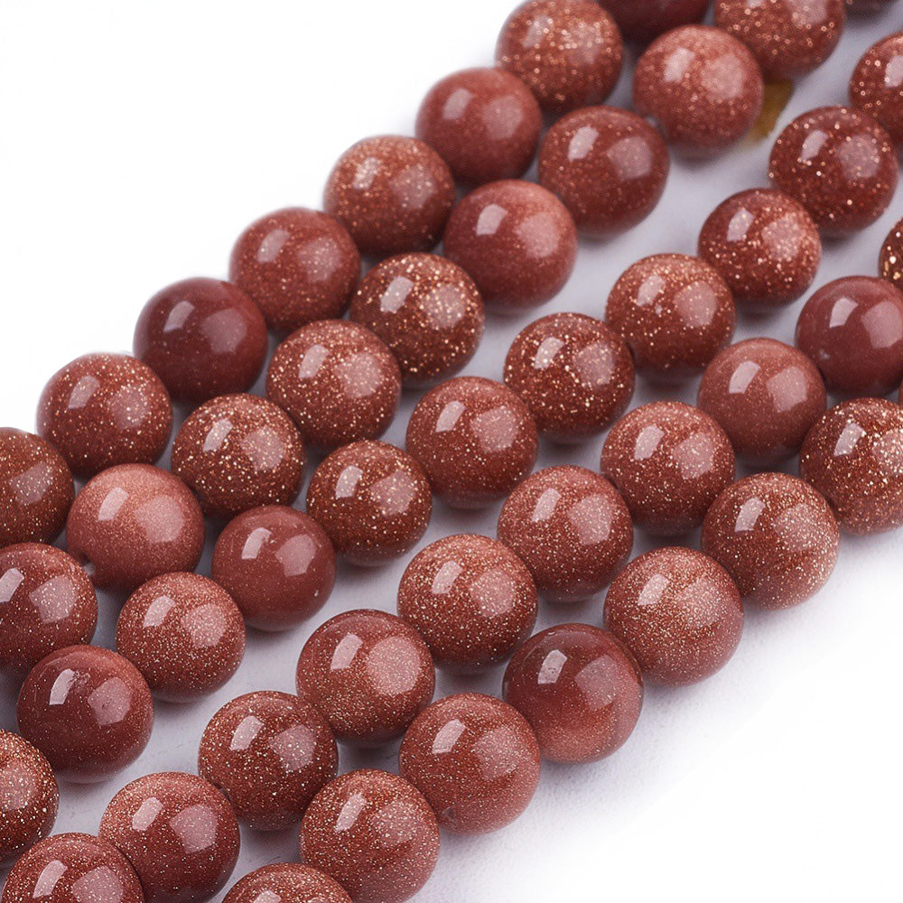 Synthetic Goldstone Beads, Round, Brown with Gold Color. Semi-Precious Gemstone Beads for DIY Jewelry Making. Great for Mala Bracelets.   Size: 4mm Diameter, Hole: 1mm; approx. 98pcs/strand, 14.5" Inches Long.  Material: Synthetic Goldstone Beads. High Quality Man Made Stone. Brown Color with Lots of Glitter. Shinny, Polished Finish. 