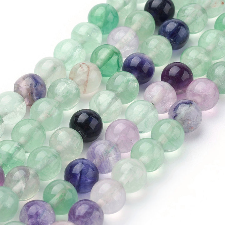 Natural Fluorite Beads, Round, Fluorite Gemstone Beads for DIY Jewelry Making.   Size: 8mm in diameter, hole: 1mm; approx. 48pcs/strand, 15 inches long.   Material: Grade AB Natural Fluorite Beads, Polished Finish. 