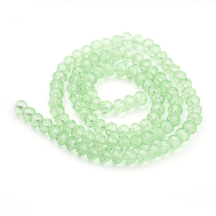 Handmade Glass Beads, Faceted, Light Green Color, Rondelle, Glass Crystal Bead Strands. Shinny, Premium Quality Crystal Beads for Jewelry Making.  Size: 4mm Diameter, 3mm Thick, Hole: 0.5mm; approx. 140pcs/strand, 15" inches long.  Material: The Beads are Made from Glass. Glass Crystal Beads, Rondelle, Light Green Color Beads. Polished, Shinny Finish.  bead lot