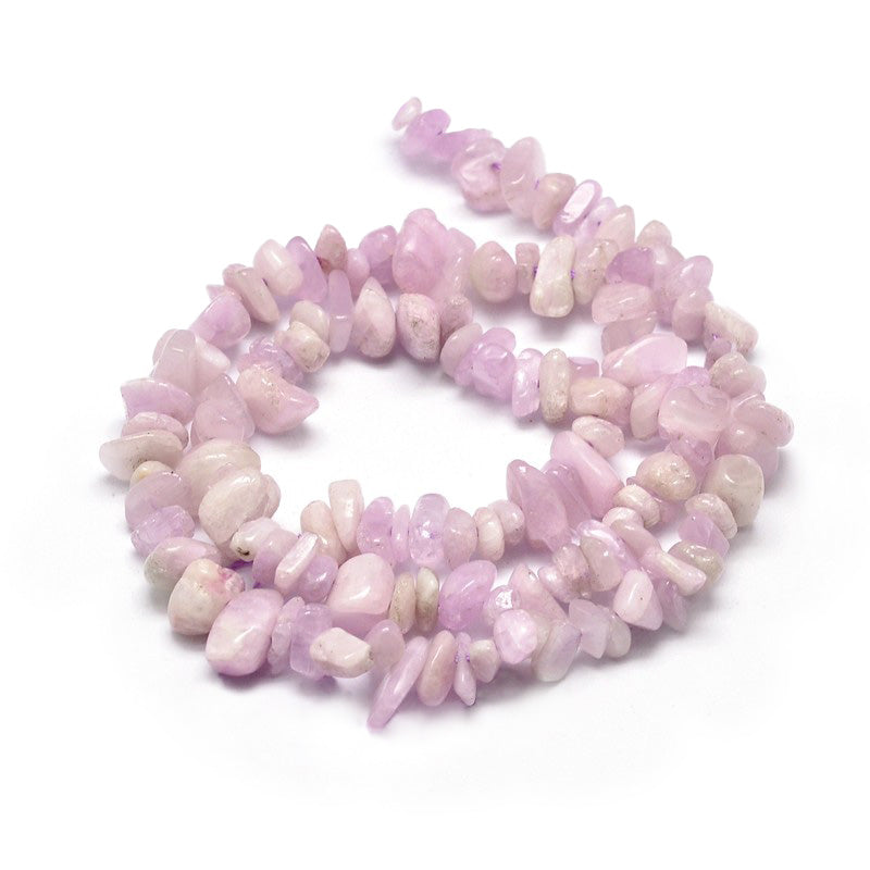 Kunzite Chip Beads, Pink Color. Spodumene Semi-Precious Stone Chips for Jewelry Making.  Size: 5~14mm wide, 4~10mm long, Hole: 1mm; approx. 15 inches long.  Material: Genuine Kunzite Natural Stone Chip Beads. Pink Color Spodumene Chip Beads. Polished, Shinny Finish.