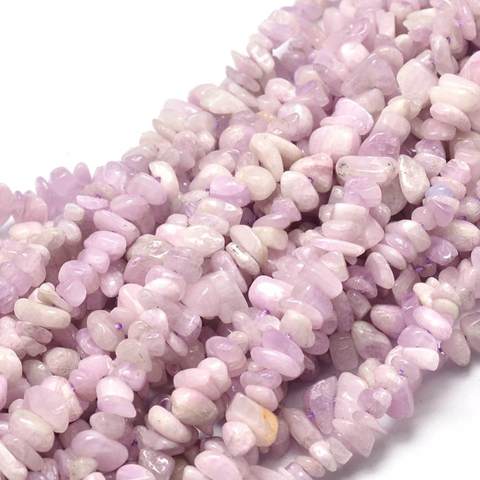 Kunzite Chip Beads, Pink Color. Spodumene Semi-Precious Stone Chips for Jewelry Making.  Size: 5~14mm wide, 4~10mm long, Hole: 1mm; approx. 15 inches long.  Material: Genuine Kunzite Natural Stone Chip Beads. Pink Color Spodumene Chip Beads. Polished, Shinny Finish.