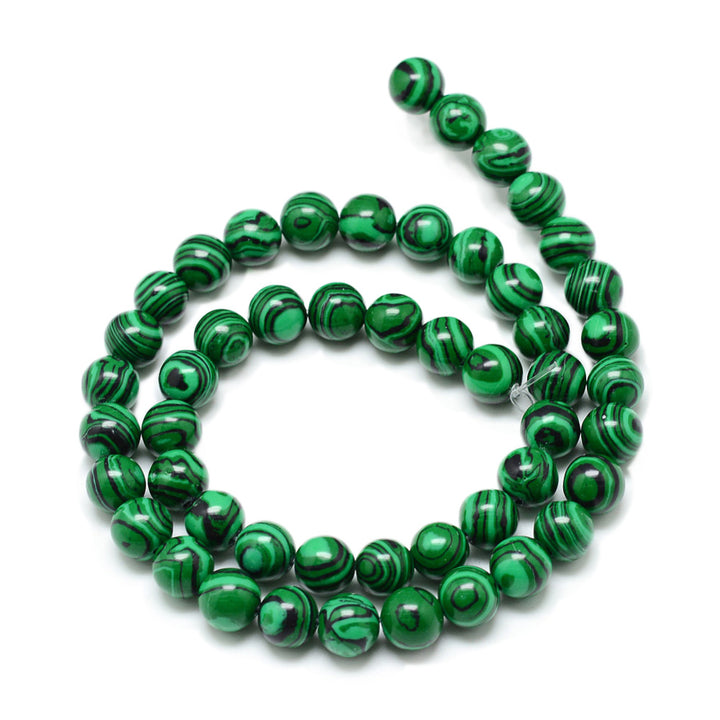 Synthetic Malachite Beads, Round, Dark Green Color. Semi-precious Stone Beads for DIY Jewelry Making.  Size: 6mm in Diameter, Hole: 1mm, approx. 62pcs/strand, 14.5" Inches Long.  Material: Synthetic Malachite Beads, dyed Dark Green Color. Smooth, Shinny Finish.