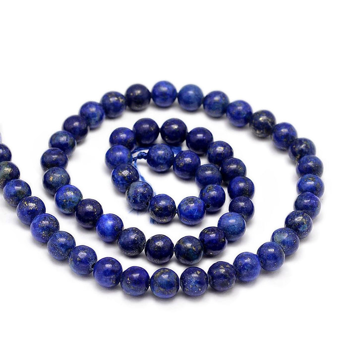 Natural Lapis Lazuli Beads, Round, Dyed, Round, Intense Deep Blue Color. Semi-precious Lapis Lazuli Gemstone Beads for DIY Jewelry Making.    Size: 10mm in diameter, hole: 1mm, approx. 38pcs/strand, 15 inches long.  Material: Genuine Natural Dark Blue Lapis Lazuli Bead Strand, Round, Loose Stone Beads. Quality Stone Beads. Intense Dark Blue Color. Shinny, Polished Finish.