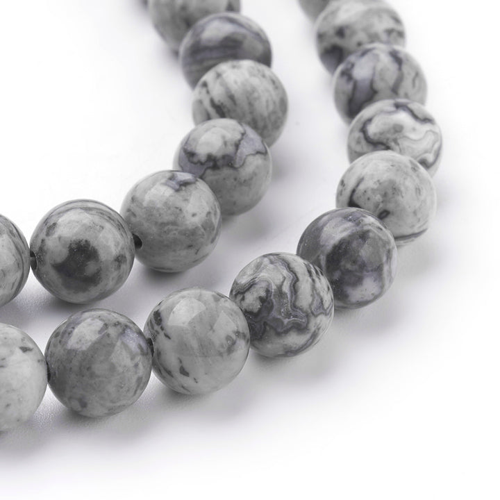 Natural Map Stone Jasper Beads, Round, Grey Color. Semi-Precious Gemstone Beads for DIY Jewelry Making. Great for Making Mala Braclets and Necklaces.  Size: 6mm Diameter, Hole: 1mm; approx. 60~65pcs/strand, 15 inches.  Material: Genuine Natural Map Stone/Picasso Stone/Picasso Jasper, Loose Stone Beads, Grey Color. High Quality Polished Stone Beads. Shinny Finish. beadlotcanada