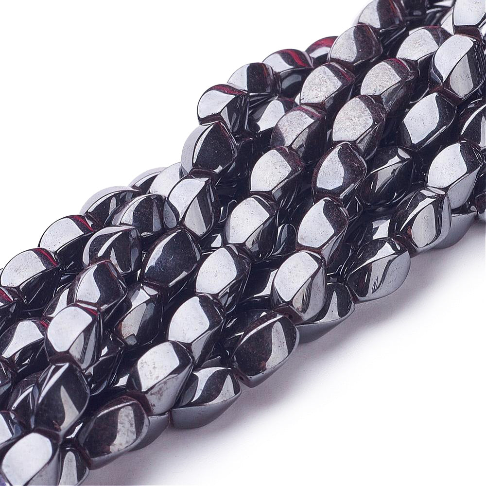 Oval Shaped Non-Magnetic Hematite Beads, Oval Twist, Metallic Gunmetal Black Color. Semi-Precious Stone Beads for Jewelry Making.  Size: 8mm Length, 5mm Width, Hole: 1mm, approx. 48pcs/strand, 15 Inches Long.  Material: Non-Magnetic Synthetic Hematite Bead Strands. Metallic Gunmetal/Black Colored Stone Beads. Polished, Shinny Metallic Lustrous Finish.