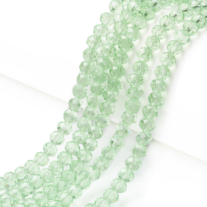 Glass Crystal Beads, Faceted, Pale Light Green Color, Rondelle, Glass Crystal Bead Strands. Shinny Crystal Beads for Jewelry Making.  Size: 10mm Diameter, 7mm Thick, Hole: 1mm; approx. 60-65pcs/strand, 16" inches long.  Material: The Beads are Made from Glass. Glass Crystal Beads, Rondelle, Light Green Color Austrian Crystal Imitation Beads. Polished, Shinny Finish.