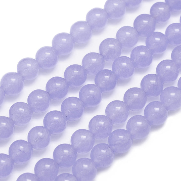 Natural White Jade Bead Strand, Round, Lilac Color. Semi-Precious Crystal Gemstone Beads for Jewelry Making. Lilac Jade Beads are Affordable and Great for Stretch Bracelets  Size: 8mm in diameter, hole: 1mm; approx. 47pcs/strand, 14.75" inches long.  Material: The Beads are Natural White Jade, Dyed a Lilac Color. Polished, Shinny Finish.