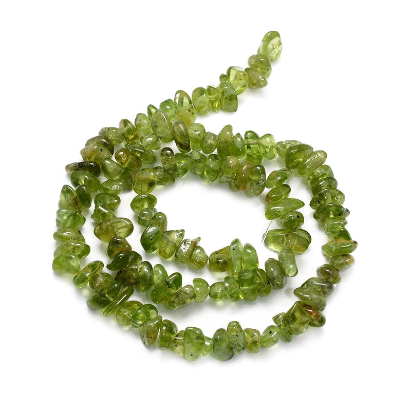 Peridot Chip Beads, Chips, Green Color. Semi-precious Peridot Beads.   Size: 3-5x3-5mm chips, Hole: 1mm; approx. 31.5 inches.  Material: Genuine Natural Peridot Chips. Green Color Chip Beads. Polished, Shinny Finish.