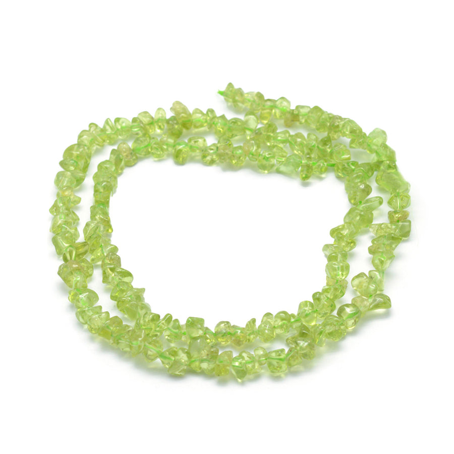 Peridot Chip Beads, Chips, Green Color. Semi-precious Peridot Beads.   Size: 3-5mm chips, Hole: 0.6mm; approx. 31.5 inches long.  Material: Genuine Natural Peridot Chips. Green Color Chip Beads. Polished, Shinny Finish.