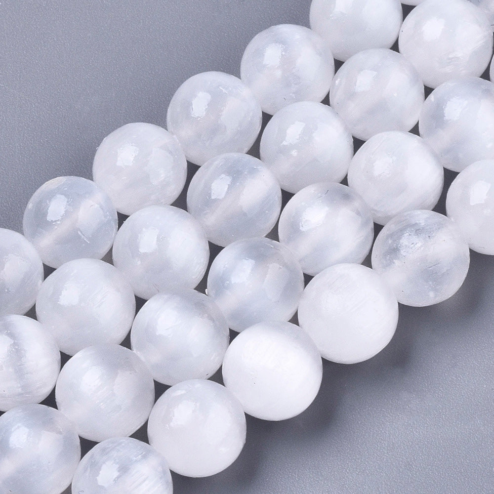 Premium Grade Selenite Beads, White Color. Semi-Precious Selenite Stone Beads for DIY Jewelry Making.   Size: 8mm Diameter, Hole: 0.9mm; approx. 47-49pcs/strand, 15" Inches Long.  Material: Premium Grade "AAA" Selenite Beads, White Color. Polished, Shinny Finish.