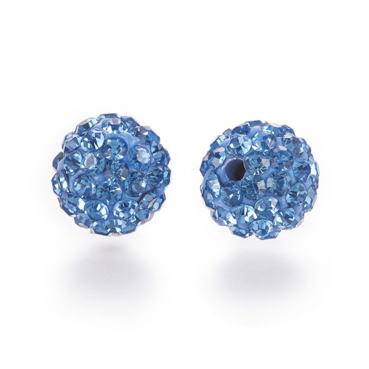 Pave Rhinestone Studded Spacer Beads, Light Sapphire Blue Color Beads with Blue Color Rhinestones. Spacers for DIY Jewelry Making. Lovely Focal Beads.  Size: 9.5-10mm Diameter, Hole: 1.5mm, Quantity: 10pcs/package.  Material: Premium Grade "A" Rhinestone Studded Polymer Clay Pave Crystal Ball Beads. 6 Rows of Rhinestones. Blue Base with Light Sapphire Blue Colored Rhinestones. Shinny Sparkling Crystal Disco Balls. 