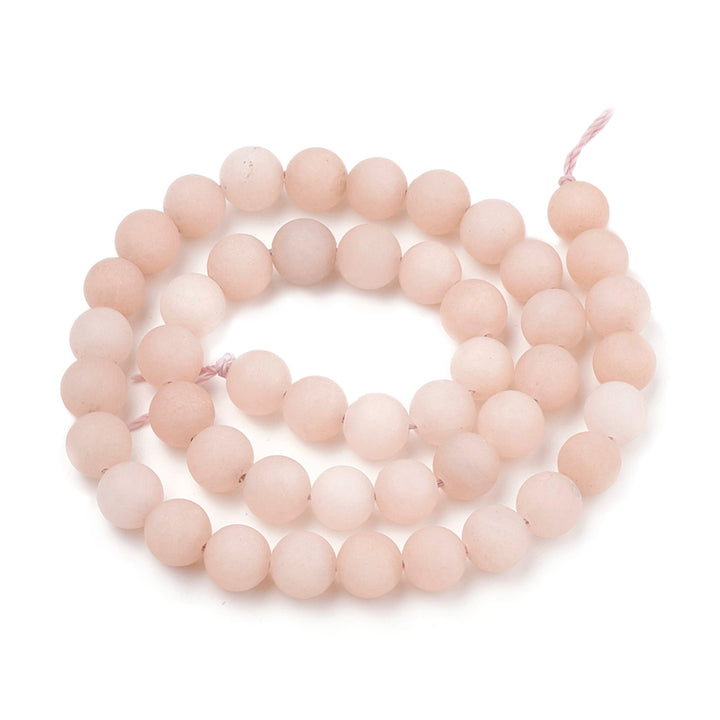 Frosted Natural Sunstone Beads, Round, Soft Peach Pink Color. Semi-precious Gemstone Cherry Blossom Jasper Beads for DIY Jewelry Making. High Quality Beads.  Size: 6mm Diameter, Hole: 1mm, approx. 61pcs/strand, 14.5" inches long.  Material: Matte Genuine Natural Sunstone Loose Stone Beads, High Quality Frosted Unpolished Stone Beads. Soft Peach Pink Color. Matte Finish. 