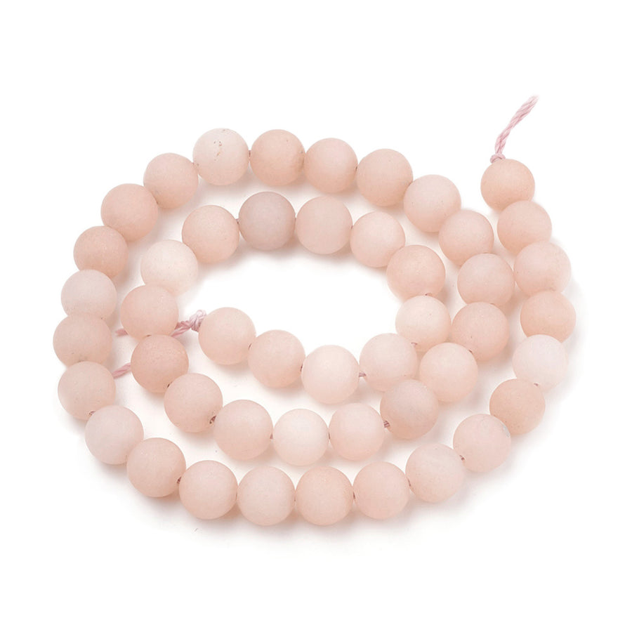 Frosted Natural Sunstone Beads, Round, Soft Peach Pink Color. Semi-precious Gemstone Cherry Blossom Jasper Beads for DIY Jewelry Making. High Quality Beads.  Size: 6mm Diameter, Hole: 1mm, approx. 61pcs/strand, 14.5" inches long.  Material: Matte Genuine Natural Sunstone Loose Stone Beads, High Quality Frosted Unpolished Stone Beads. Soft Peach Pink Color. Matte Finish. 