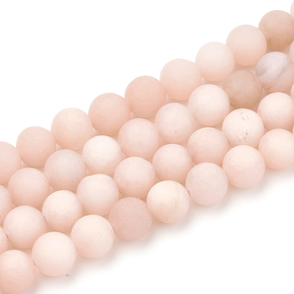 Frosted Natural Sunstone Beads, Round, Soft Peach Pink Color. Semi-precious Gemstone Cherry Blossom Jasper Beads for DIY Jewelry Making. High Quality Beads.  Size: 6mm Diameter, Hole: 1mm, approx. 61pcs/strand, 14.5" inches long.  Material: Matte Genuine Natural Sunstone Loose Stone Beads, High Quality Frosted Unpolished Stone Beads. Soft Peach Pink Color. Matte Finish. 