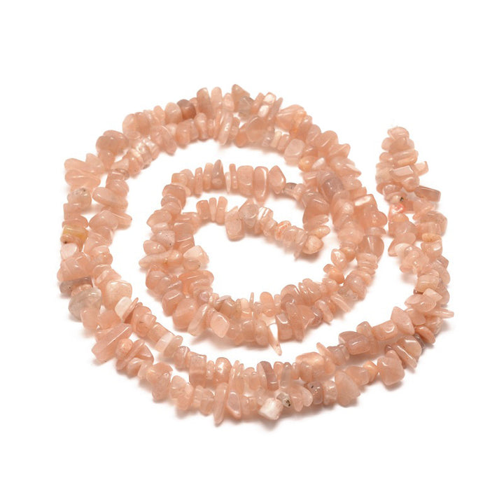Natural Sunstone Chip Beads. Semi-Precious Stone Chips for Jewelry Making.  Size: 5-8mm width, 5-8mm length, hole: 1mm; approx. 31.5 inches long.  Material: Genuine Sunstone Chip Bead Strands. Polished, Shinny Finish.