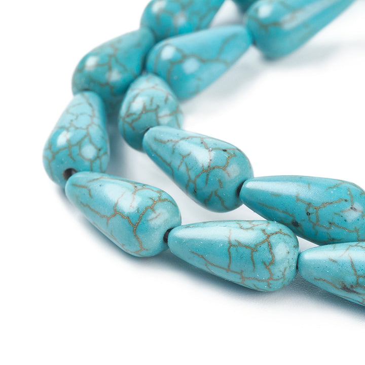 Synthetic Turquoise Teardrop Beads for DIY Jewelry Making. Turquoise Colored Teardrop.  Size: 14mm Length, 7mm Width, Hole: 1mm, approx. 28pcs/strand, 15 Inches Long.  Material: Synthetic Turquoise Beads. Dyed, Turquoise Color, Teardrop Shape, Polished Finish.